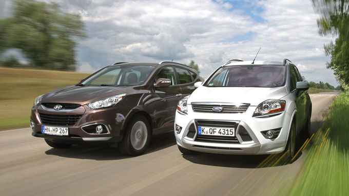 Ford Kuga and Hyundai iX35 driving on the road
